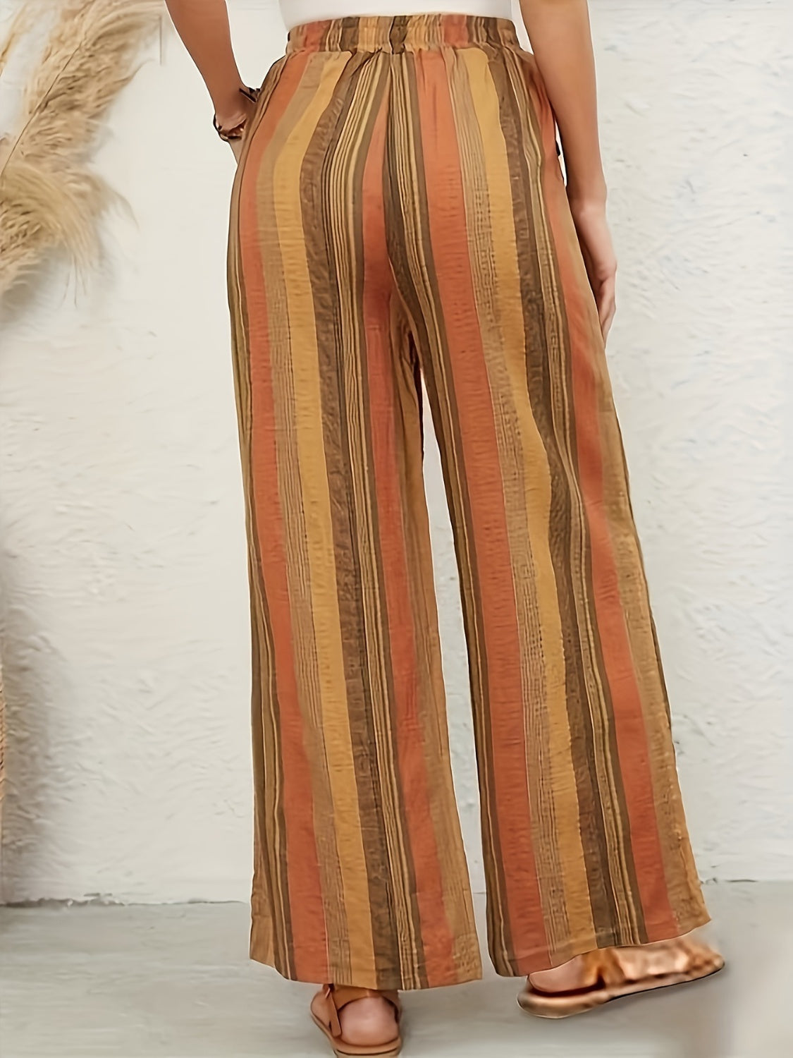 Drawstring striped wide leg pants with pockets, opaque.
