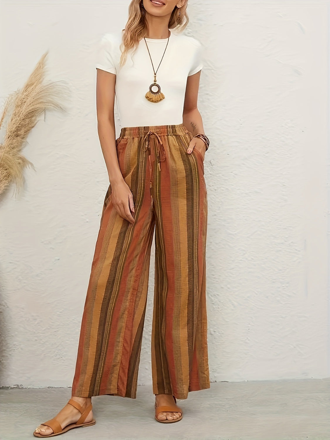 Drawstring striped wide leg pants with pockets, opaque.