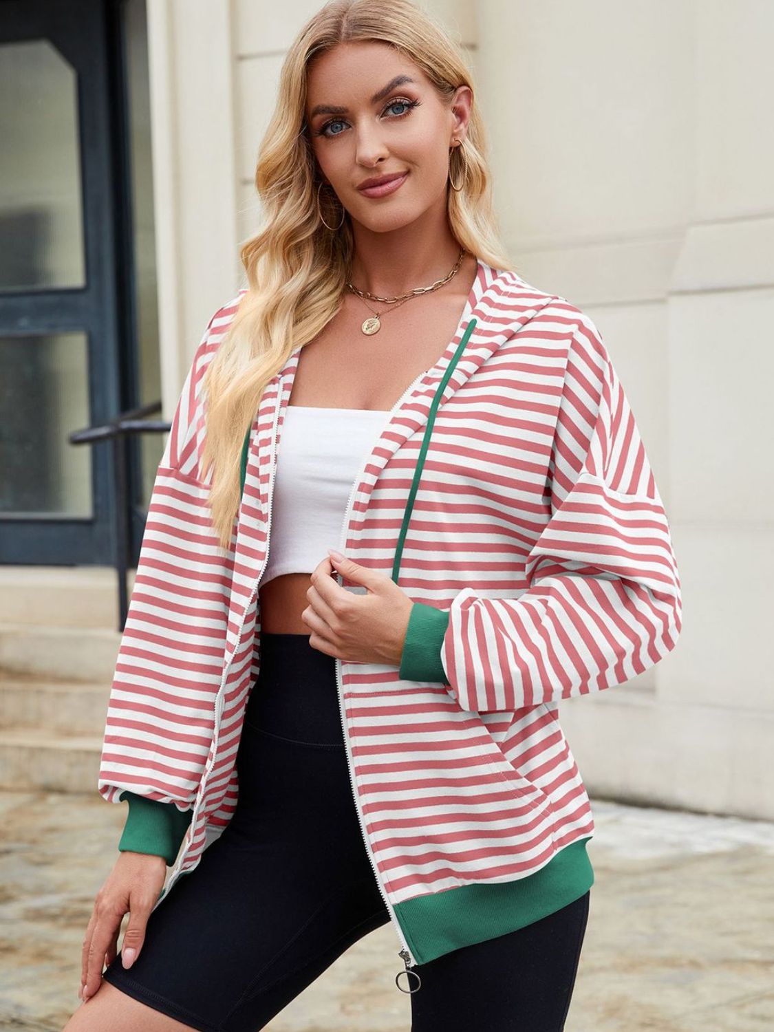 Drawstring striped zip up long sleeve hoodie with pockets.