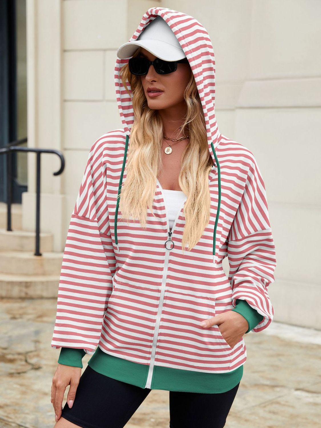 Drawstring striped zip up long sleeve hoodie with pockets.
