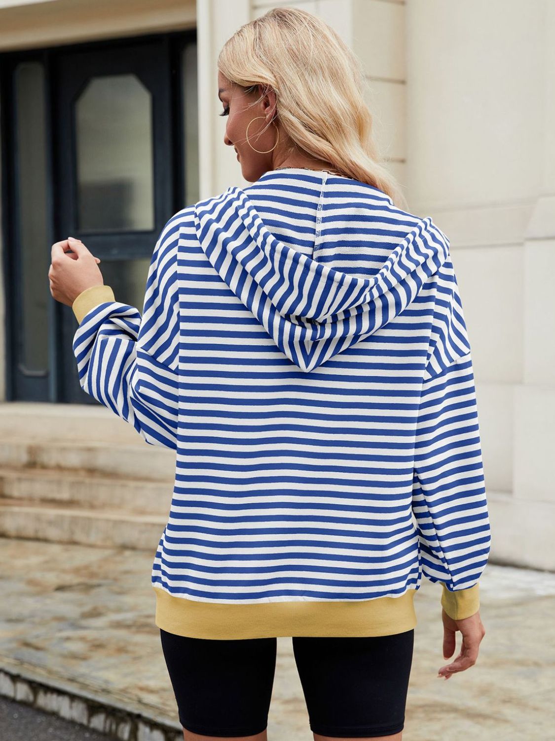 Drawstring striped zip up long sleeve hoodie with pockets.