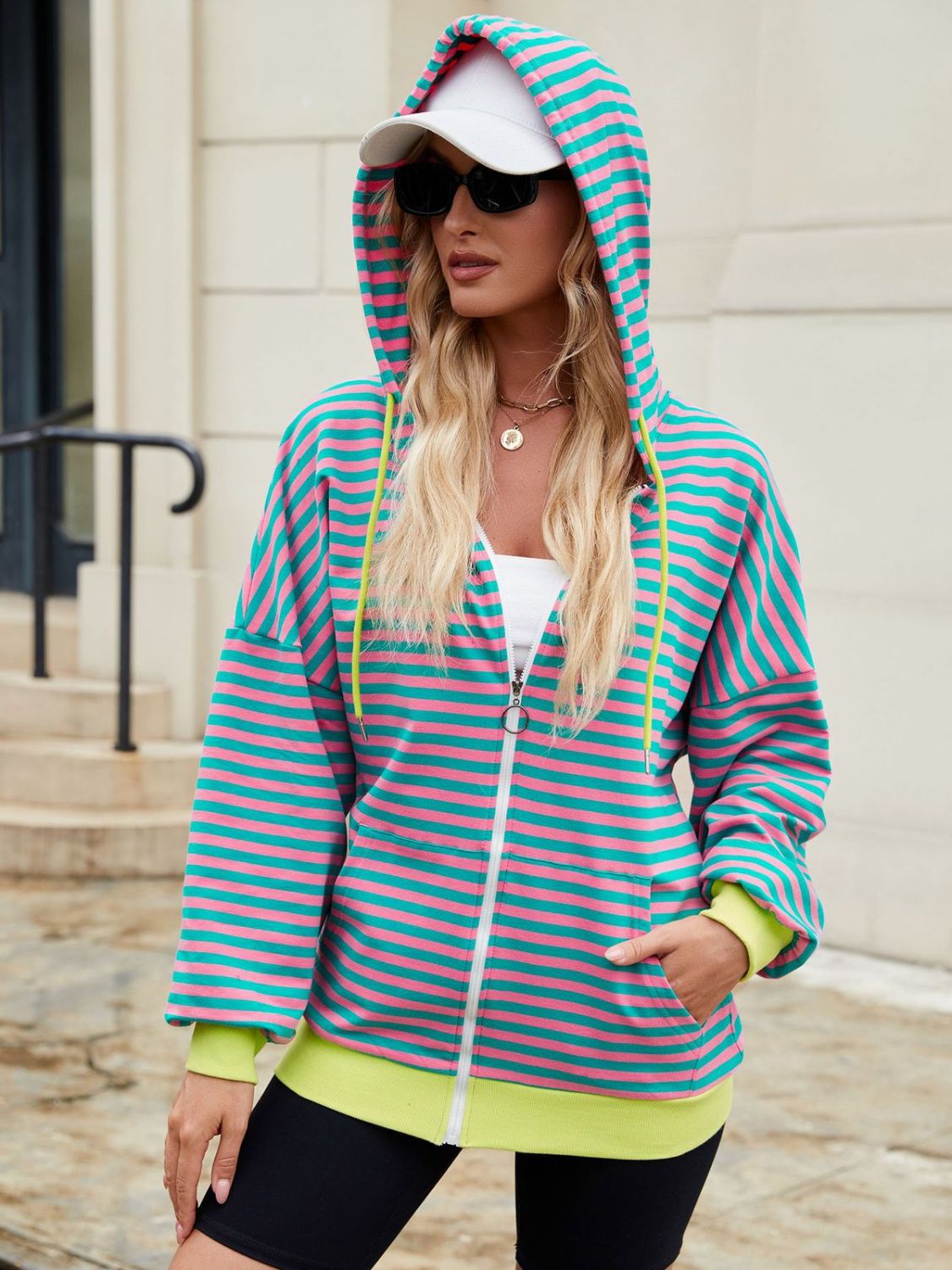 Drawstring striped zip up long sleeve hoodie with pockets.
