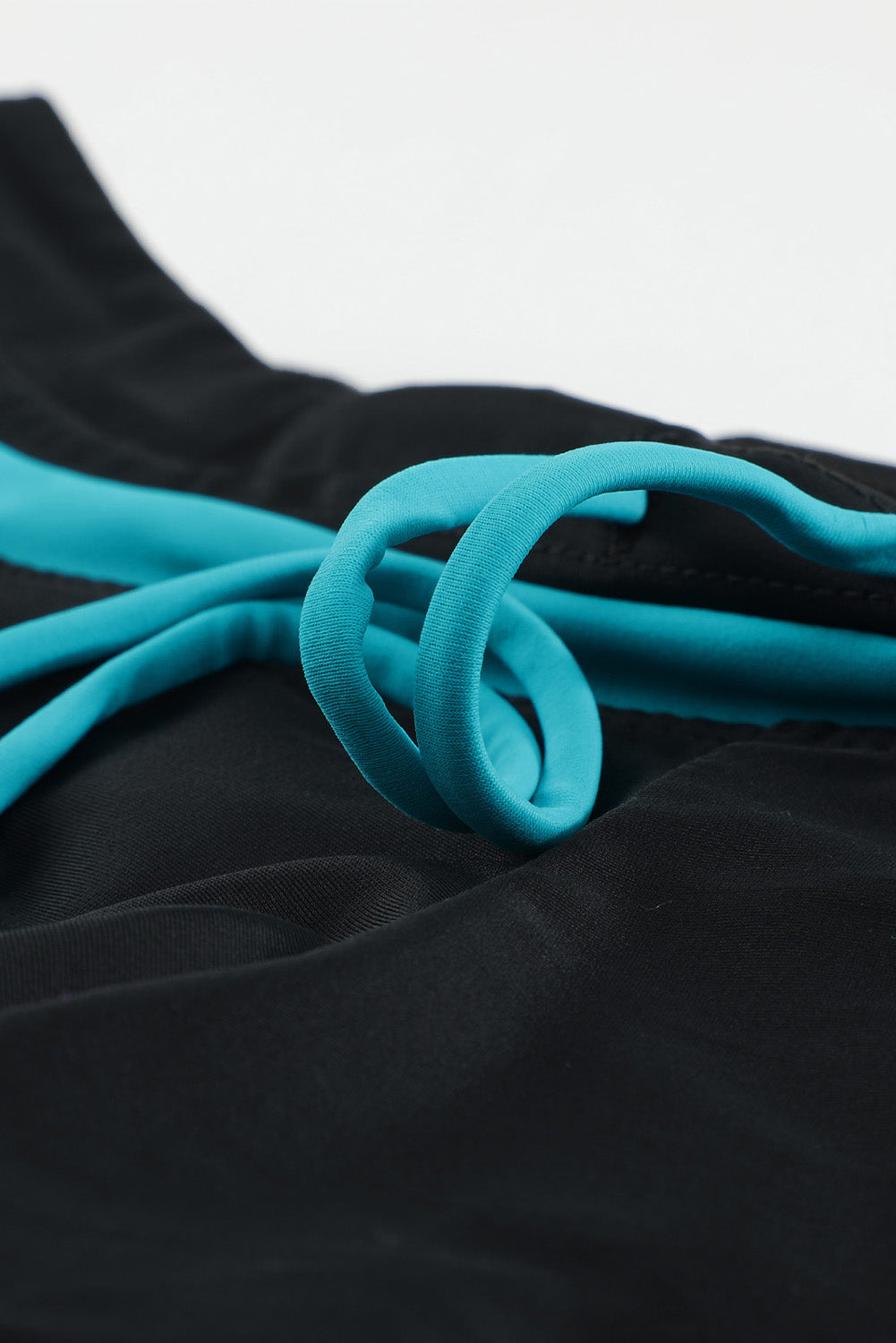 Drawstring swim shorts.