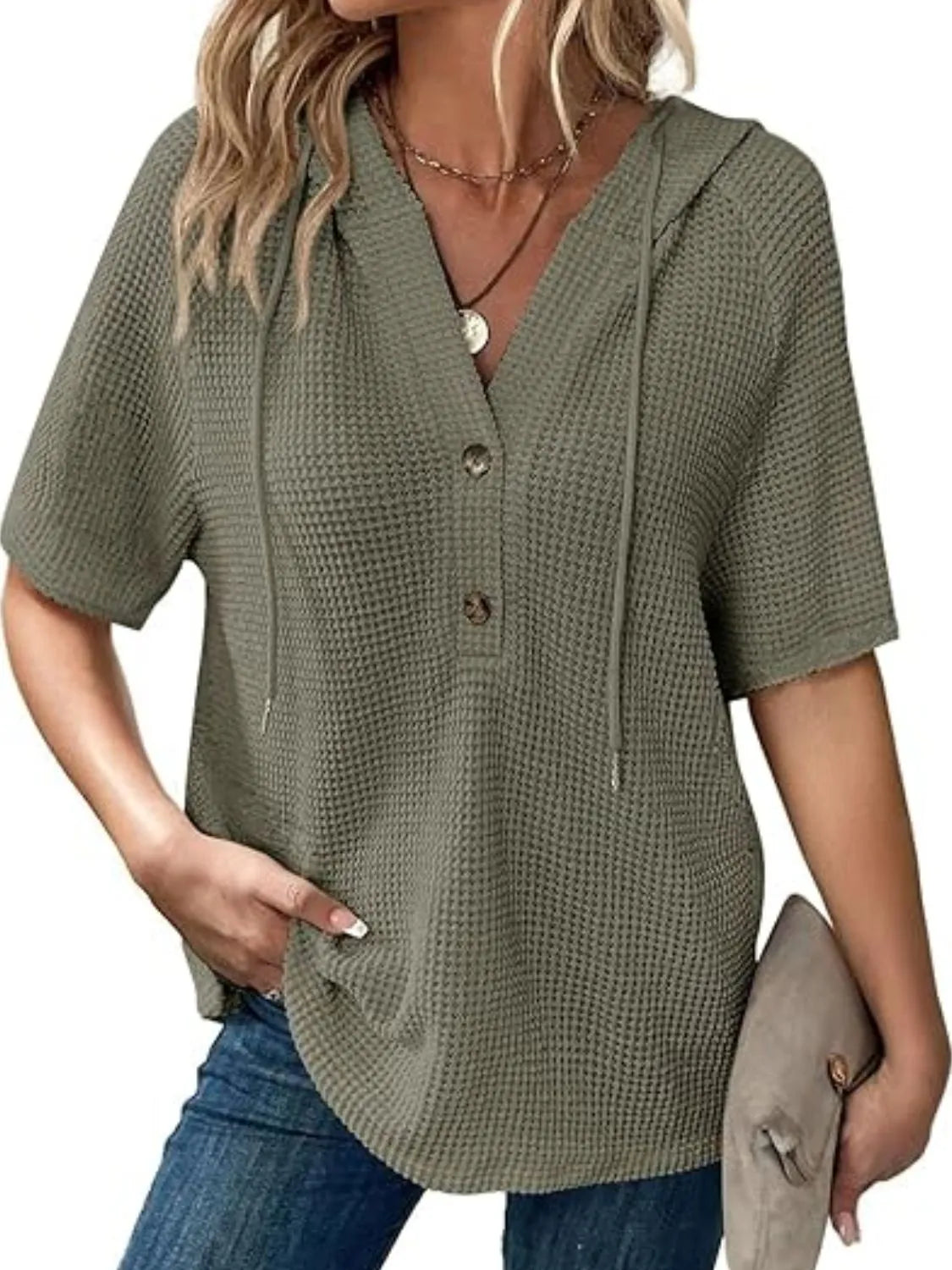 Drawstring waffle-knit short sleeve hooded top with buttons.