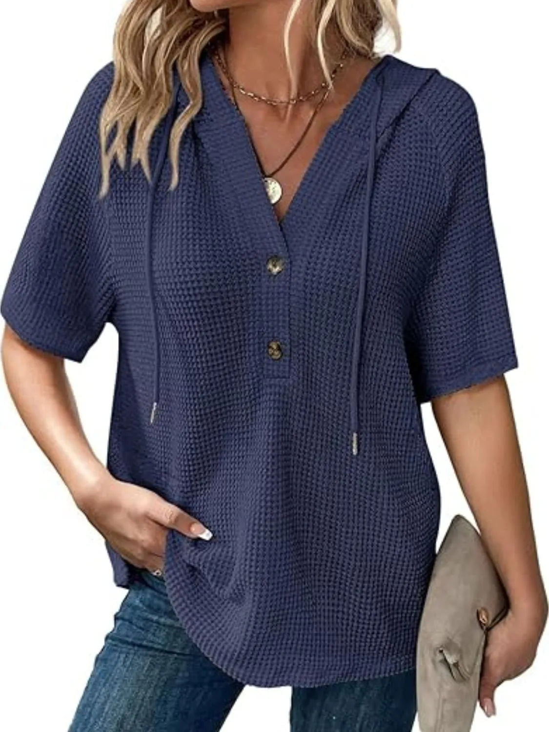 Drawstring waffle-knit short sleeve hooded top with buttons.