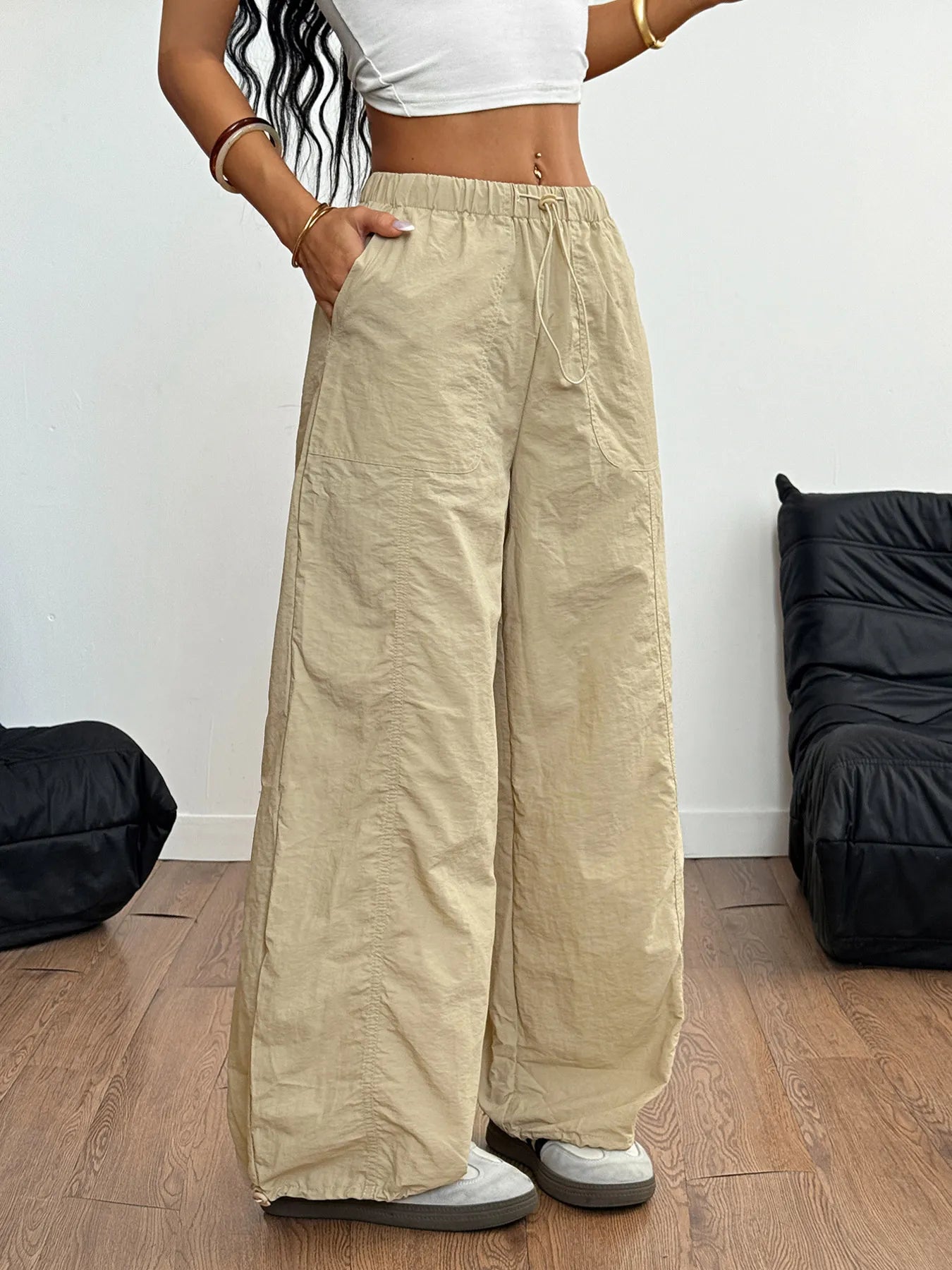 Drawstring wide leg cargo pants with pockets.