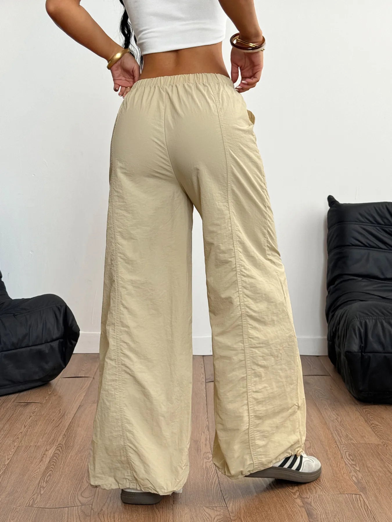 Drawstring wide leg cargo pants with pockets.
