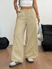 Drawstring wide leg cargo pants with pockets.