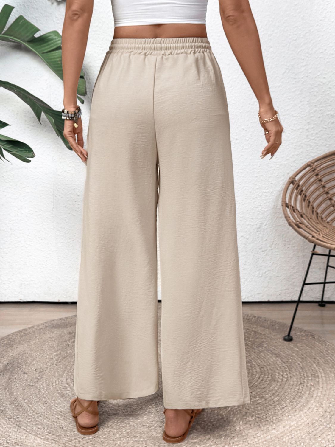 Drawstring wide leg pants with pockets, opaque.