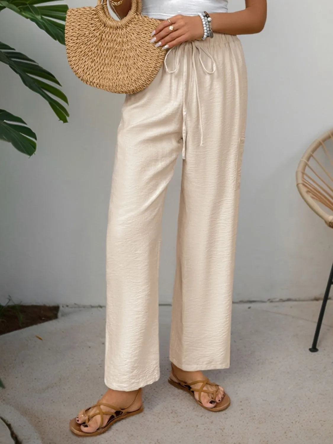 Drawstring wide leg pants with pockets.