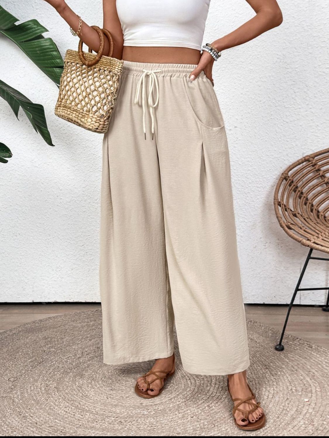 Drawstring wide leg pants with pockets, opaque.
