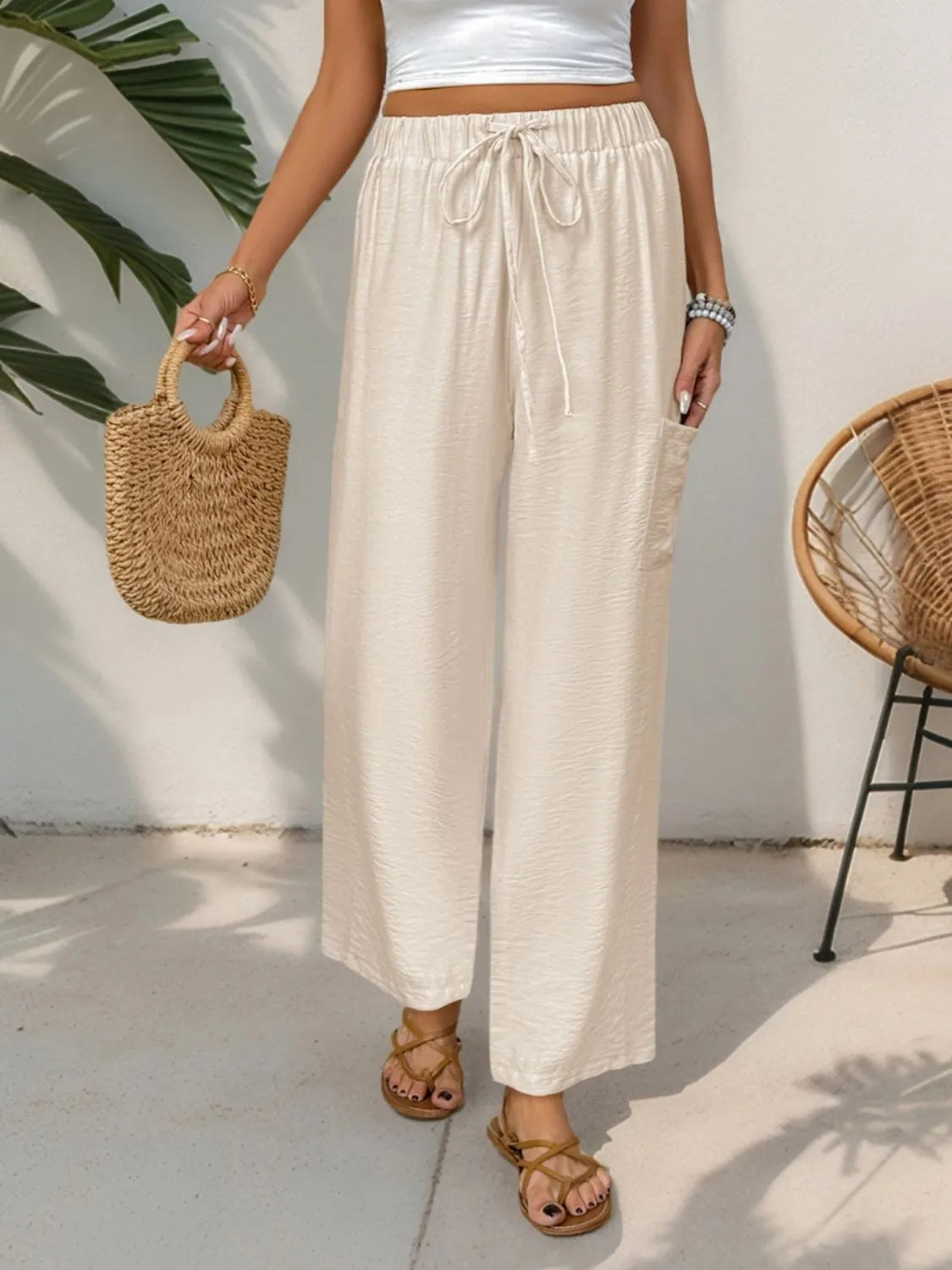 Drawstring wide leg pants with pockets.