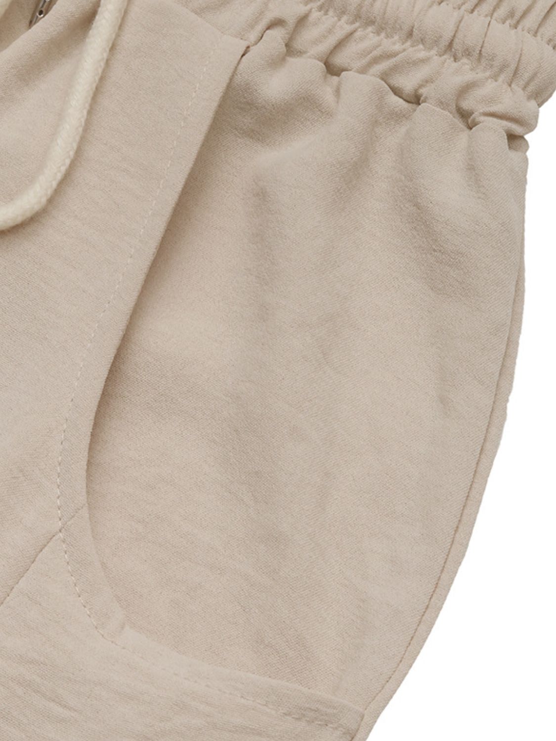 Drawstring wide leg pants with pockets, opaque.