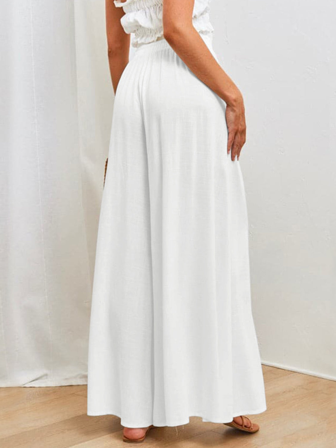 Drawstring wide leg pants with pockets, opaque.