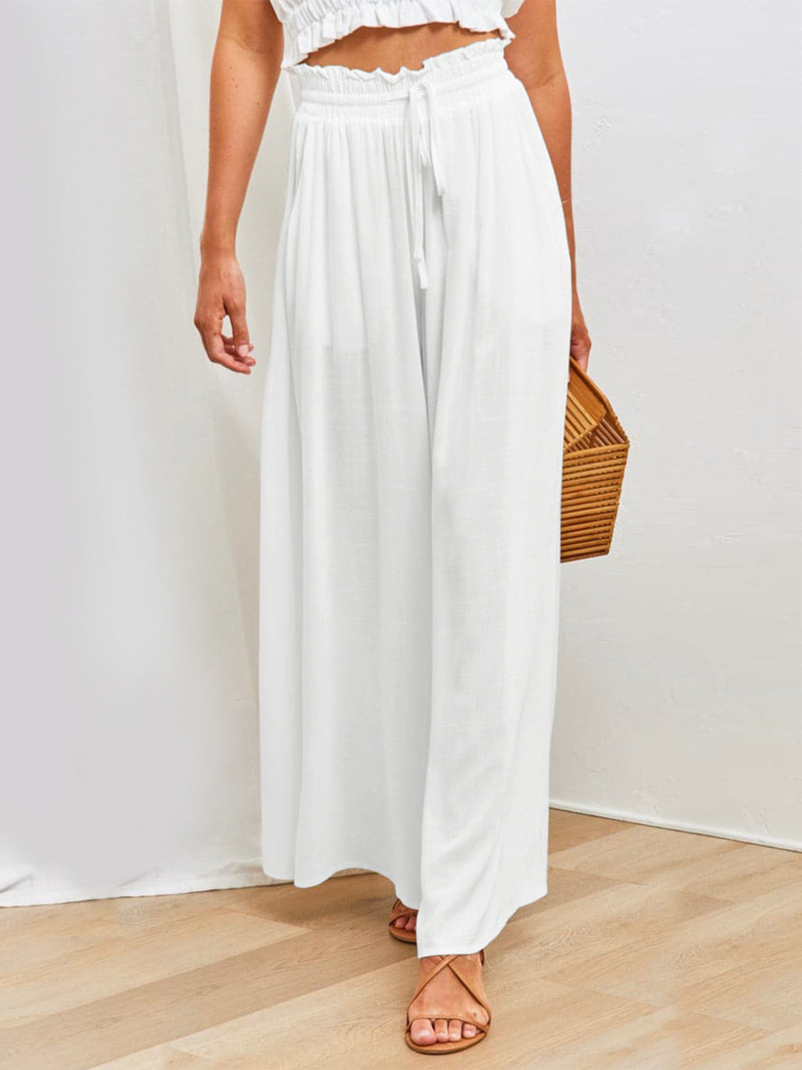 Drawstring wide leg pants with pockets, opaque.