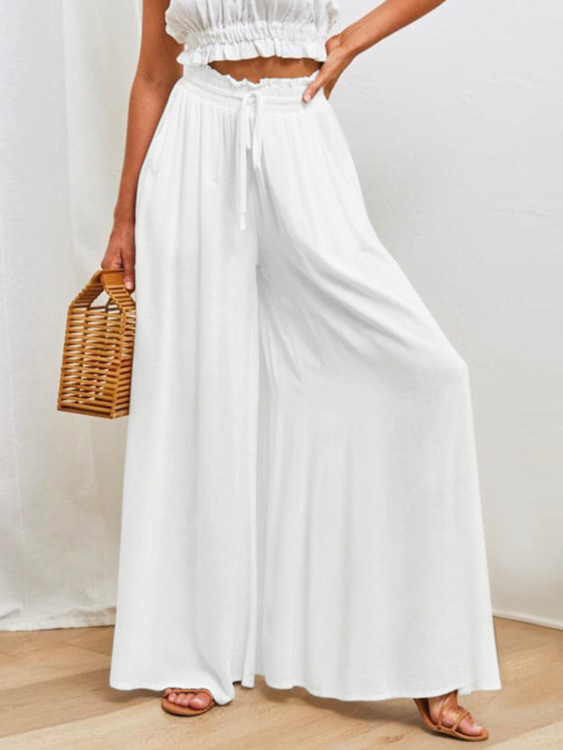 Drawstring wide leg pants with pockets, opaque.