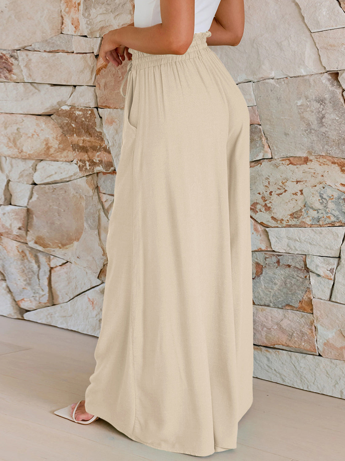 Drawstring wide leg pants with pockets, opaque.