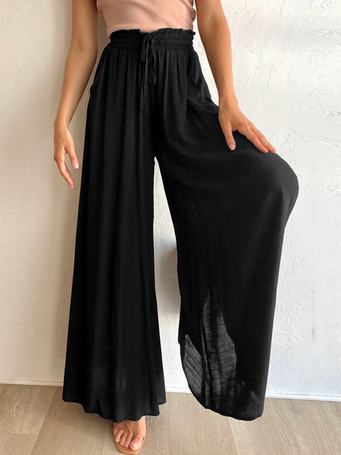 Drawstring wide leg pants with pockets, opaque.