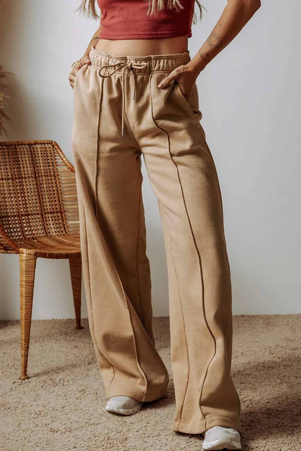 Drawstring wide leg pants with pockets, opaque.