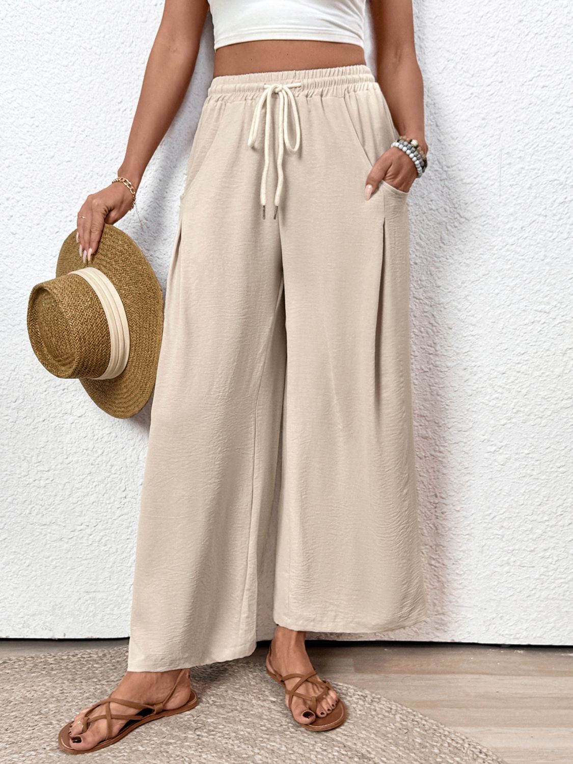 Drawstring wide leg pants with pockets, opaque.