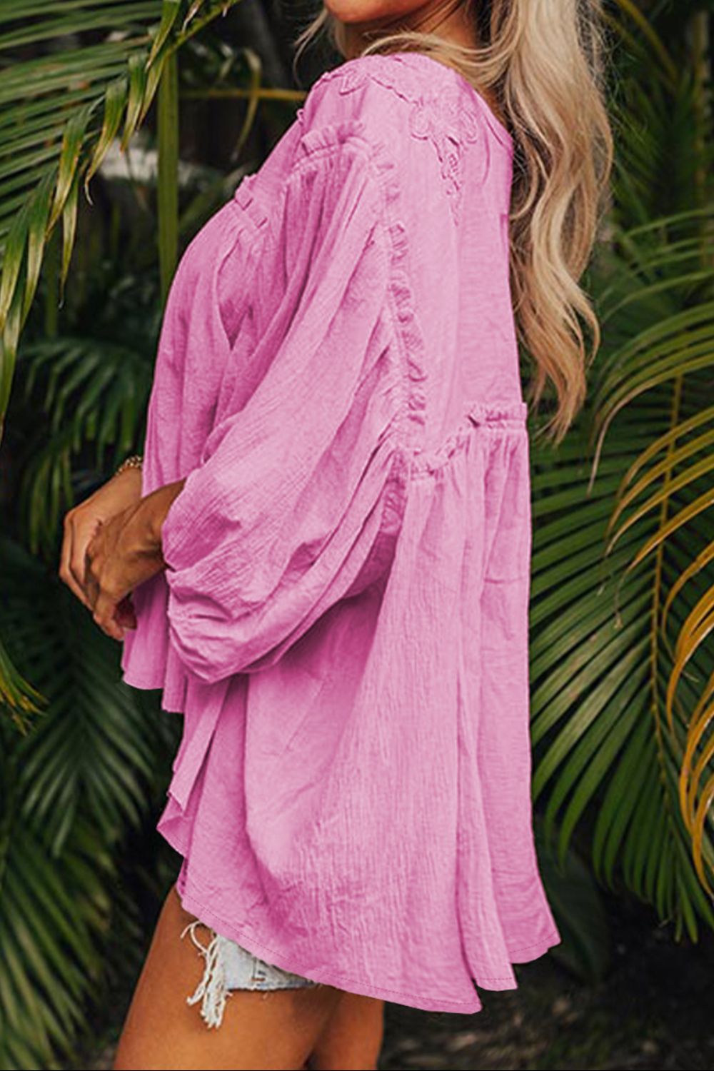 Dropped shoulder round neck blouse with lace detail.