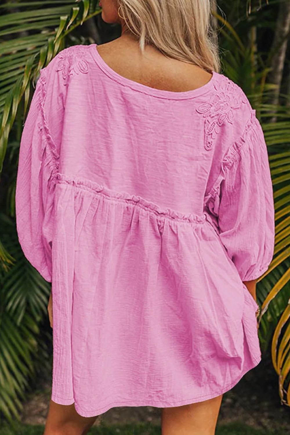 Dropped shoulder round neck blouse with lace detail.