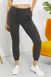 Easy living ribbed joggers with drawstring and pockets, cropped length, moderate stretch.