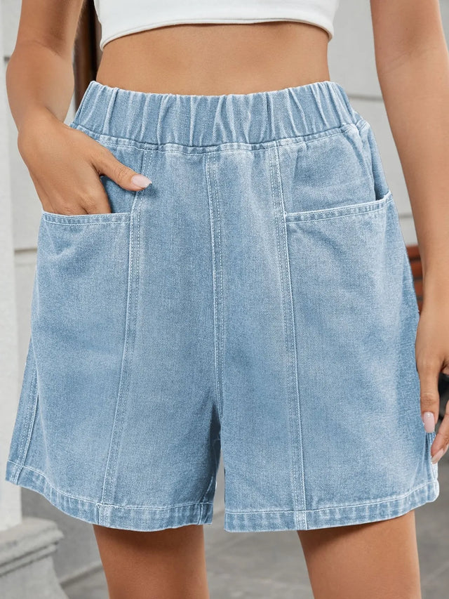 Elastic waist denim shorts with pockets.