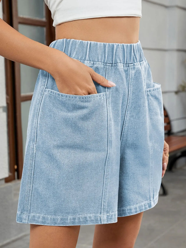 Elastic waist denim shorts with pockets.