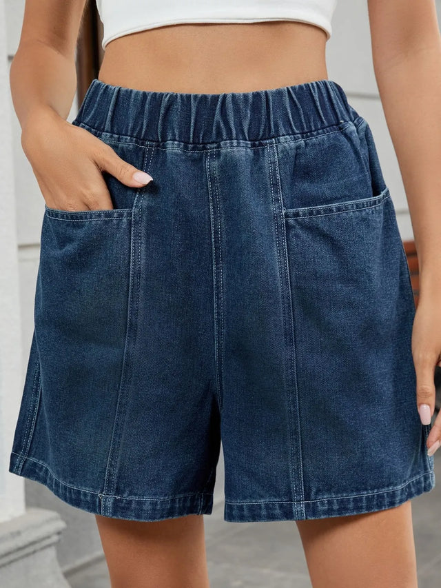 Elastic waist denim shorts with pockets.