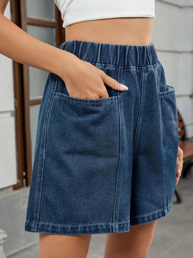 Elastic waist denim shorts with pockets.