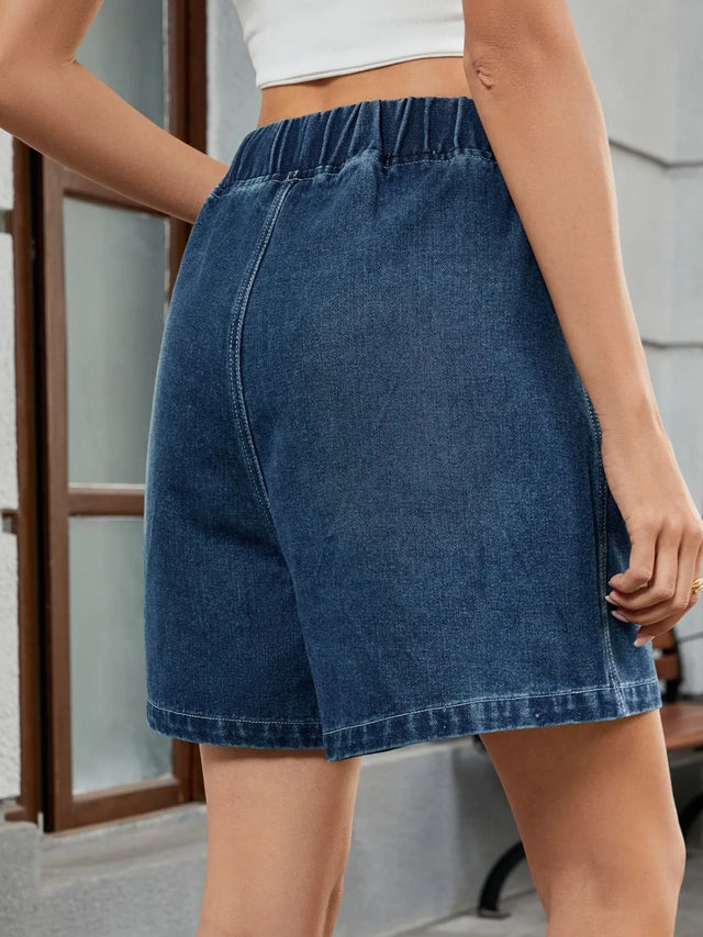 Elastic waist denim shorts with pockets.
