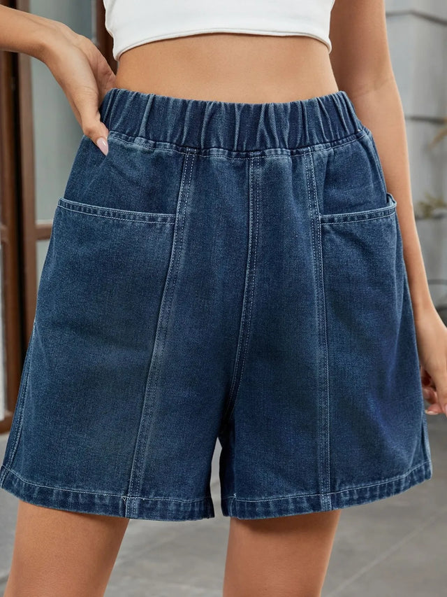 Elastic waist denim shorts with pockets.