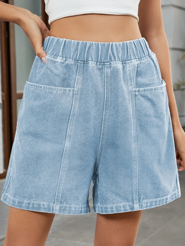 Elastic waist denim shorts with pockets.