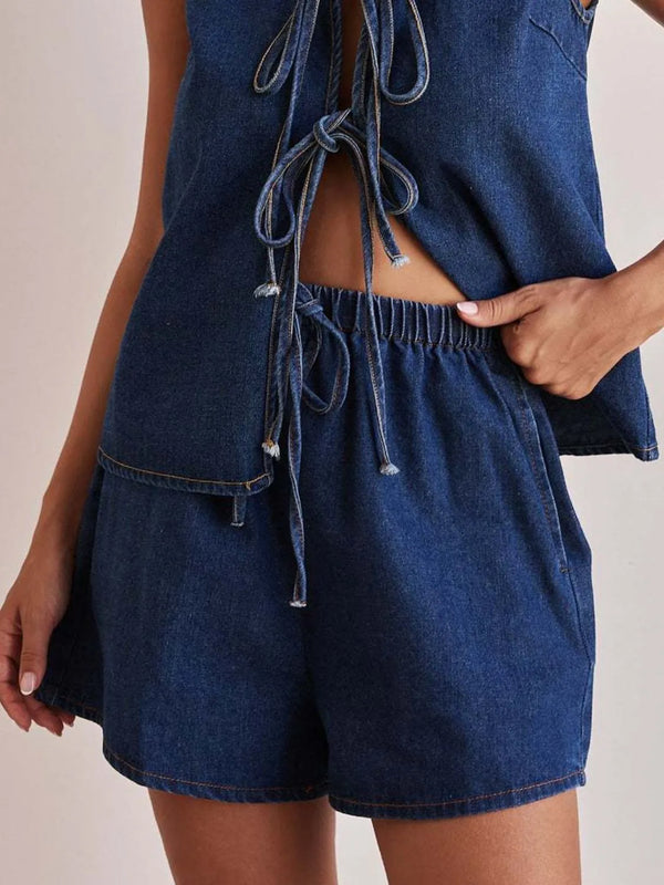Elastic waist denim shorts with tie detail.