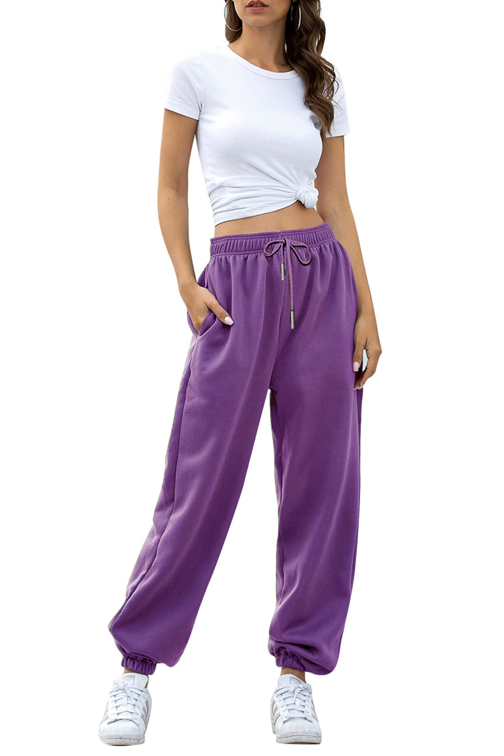 Elastic waist joggers with tie and pockets, opaque.