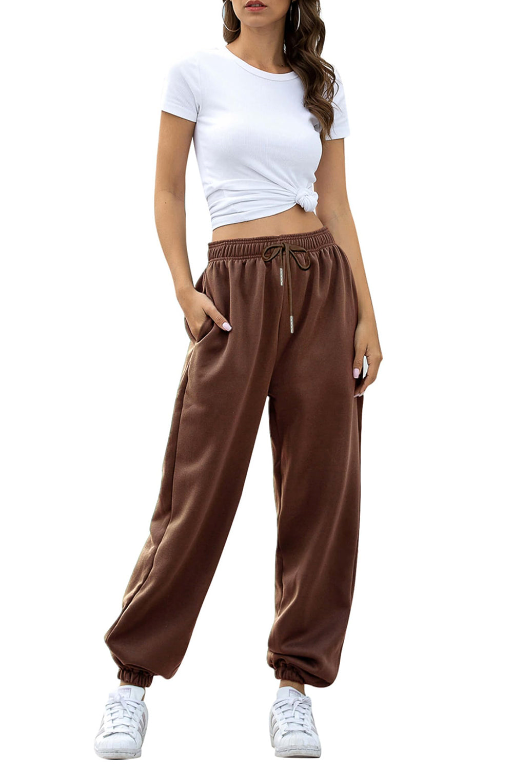 Elastic waist joggers with tie and pockets, opaque.