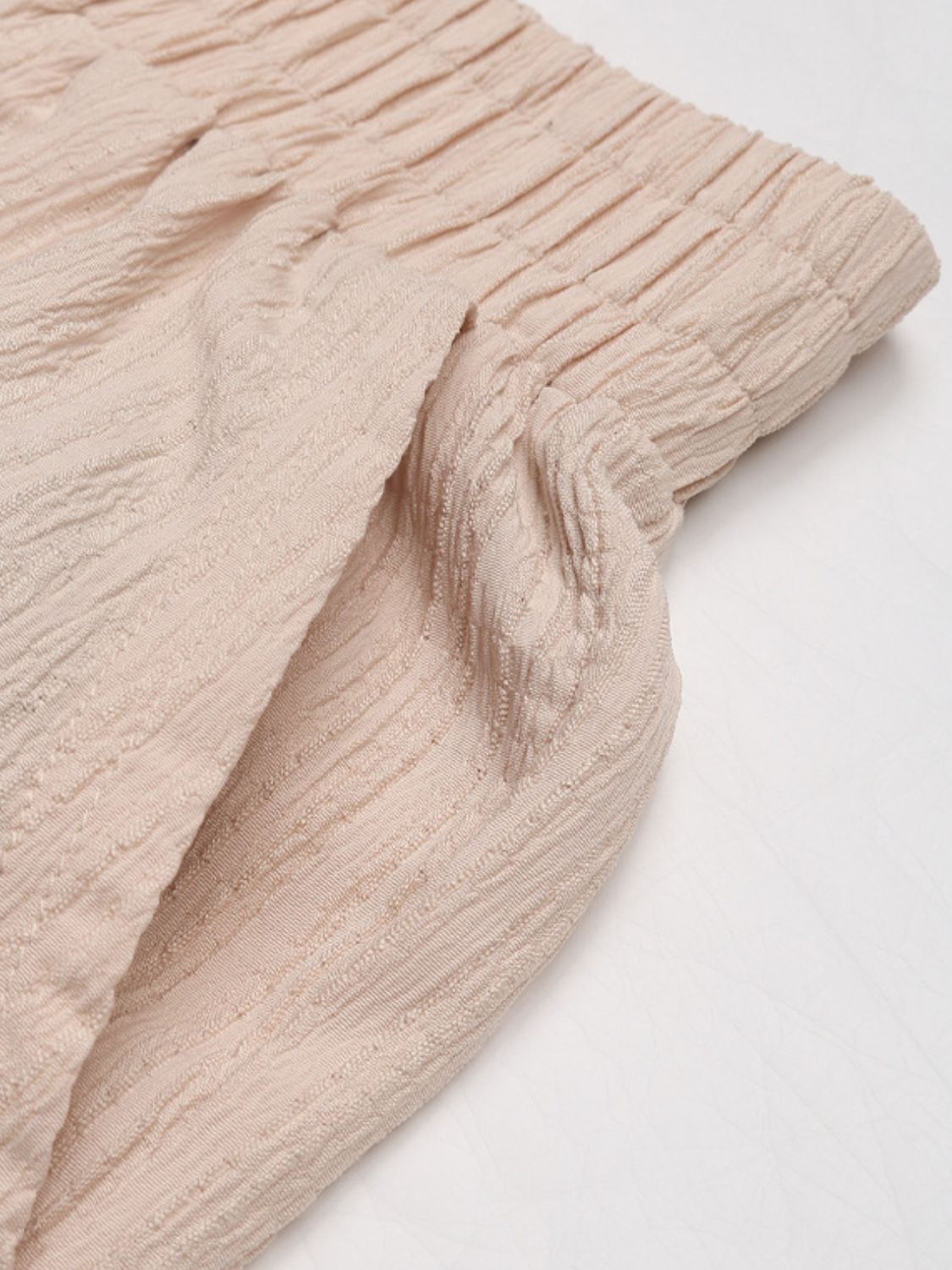 Elastic waist joggers with drawstring and pockets, opaque.