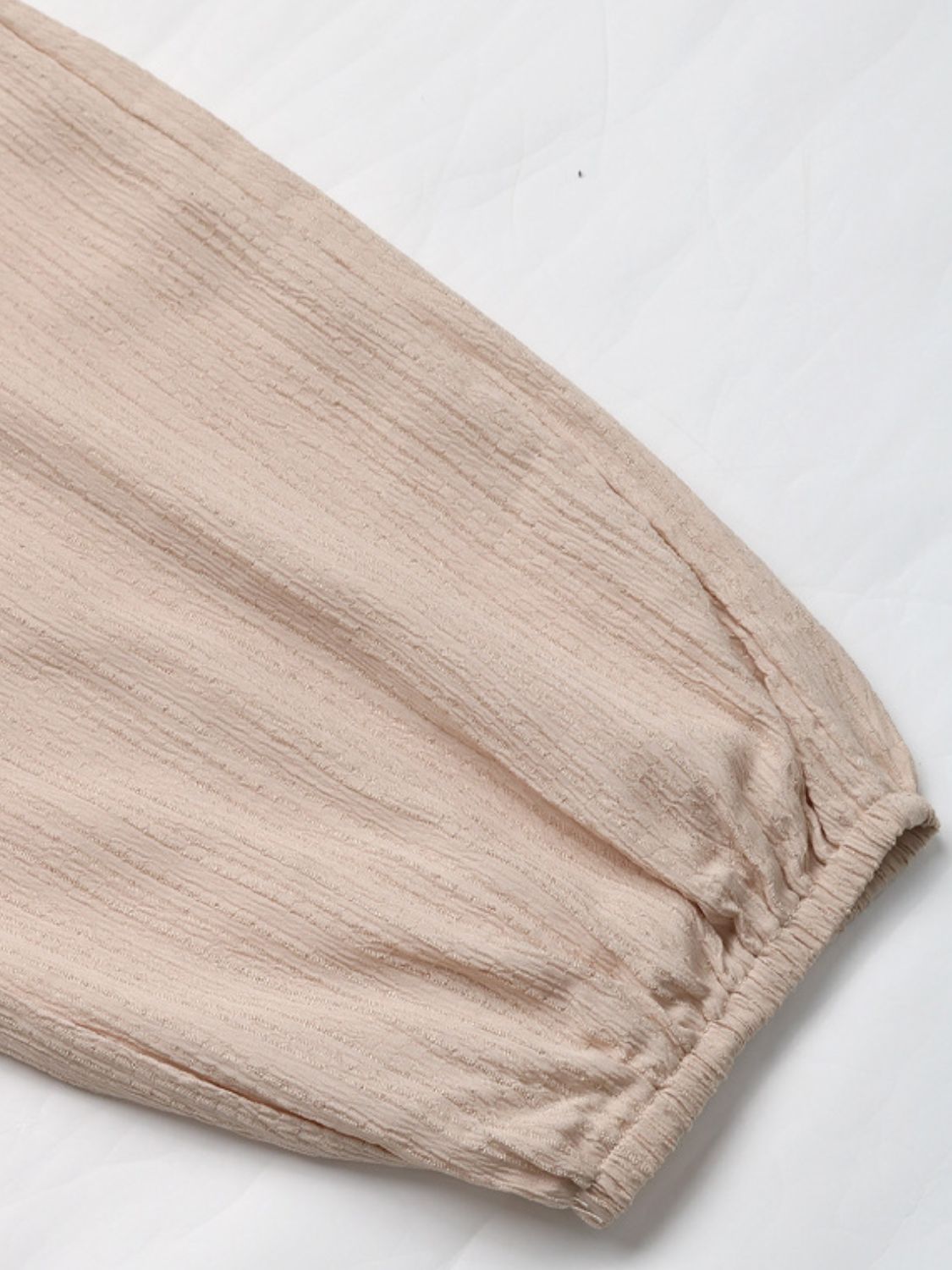 Elastic waist joggers with drawstring and pockets, opaque.