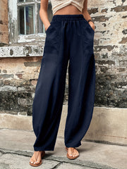 Elastic waist pants with pockets, opaque.