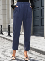 Elastic waist pants with pockets, opaque.