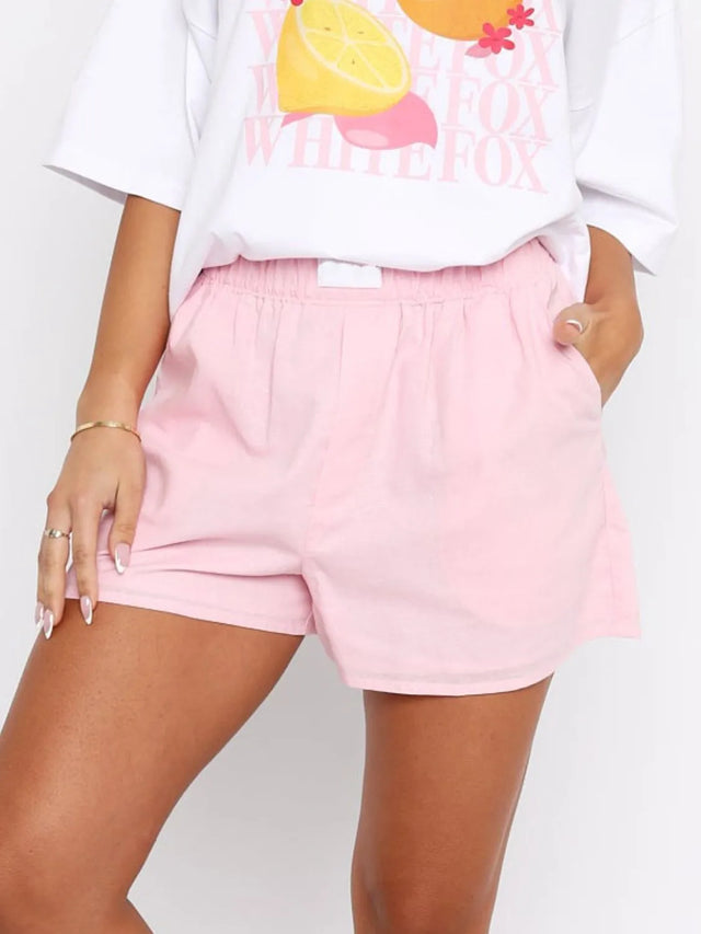 Elastic waist shorts with pockets.