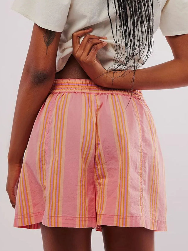 Elastic waist shorts with pockets.
