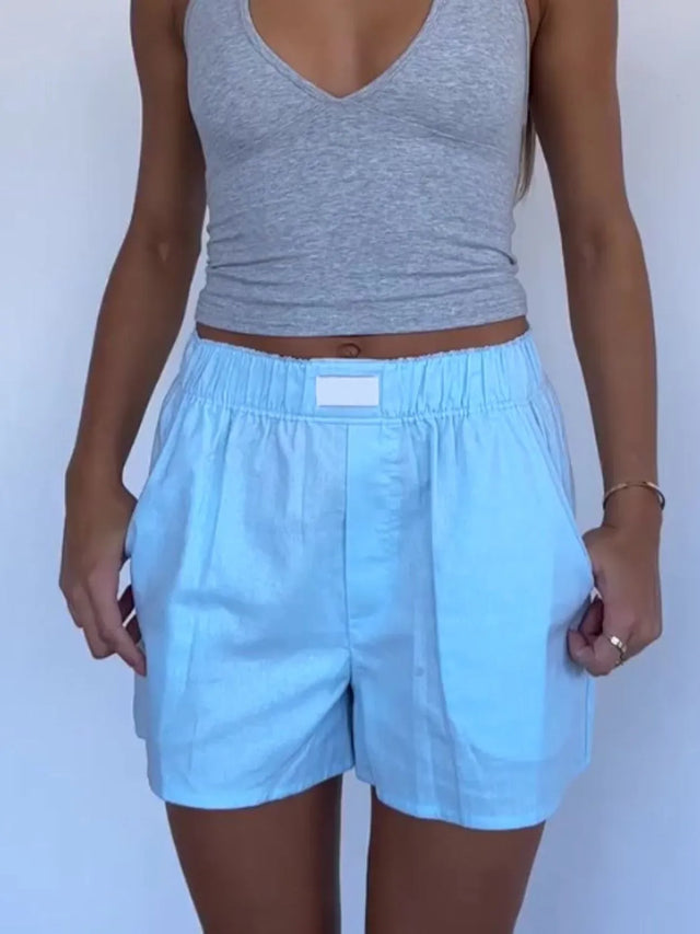 Elastic waist shorts with pockets.