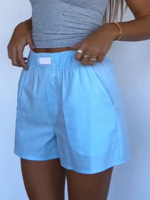Elastic waist shorts with pockets.