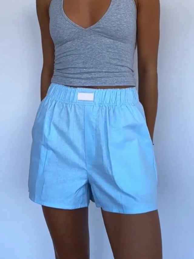 Elastic waist shorts with pockets.