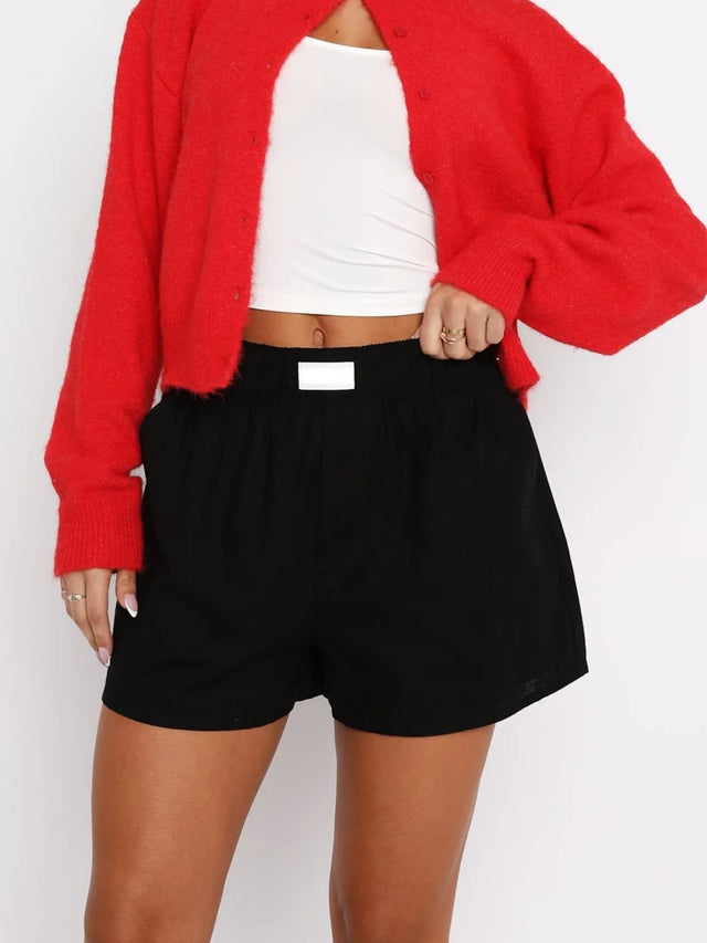 Elastic waist shorts with pockets.