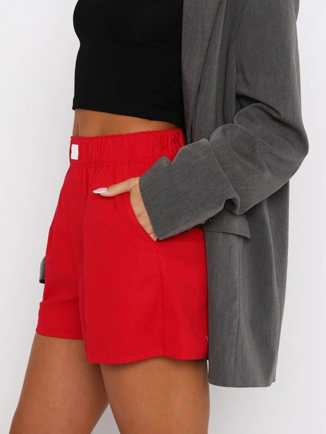 Elastic waist shorts with pockets.