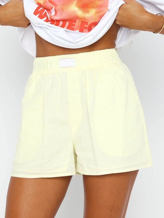 Elastic waist shorts with pockets.