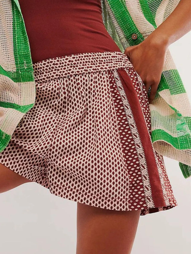 Elastic waist shorts with pockets.